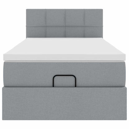 Ottoman bed met matras en LED's 90x200 cm stof lichtgrijs