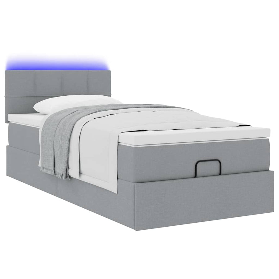 Ottoman bed met matras en LED's 100x200 cm stof lichtgrijs