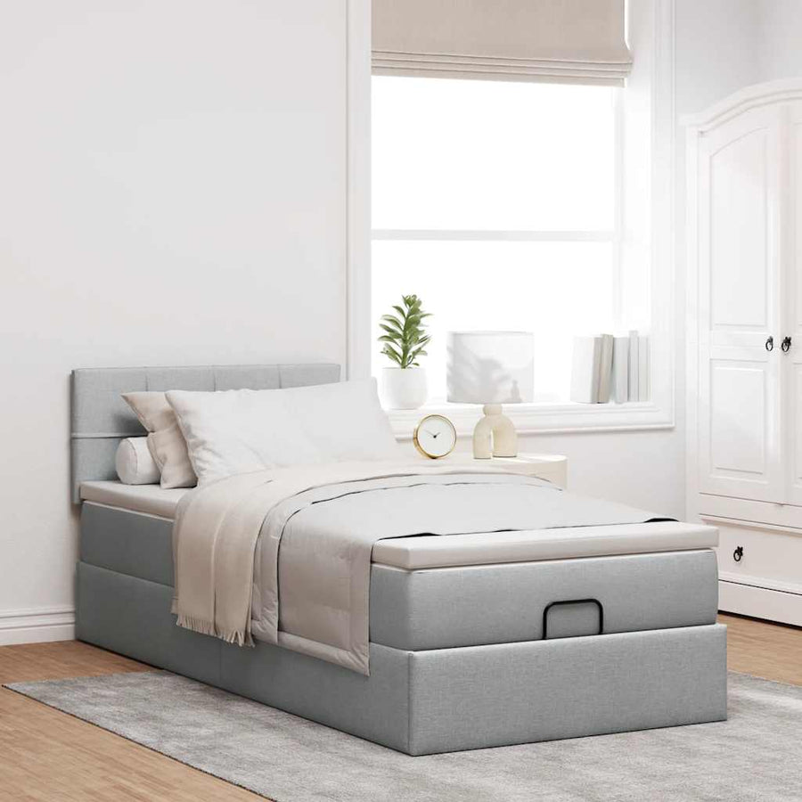 Ottoman bed met matras en LED's 100x200 cm stof lichtgrijs