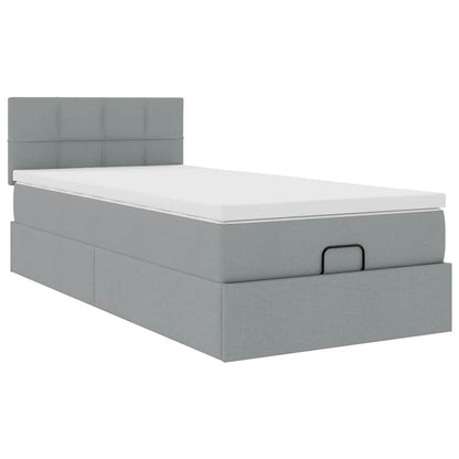 Ottoman bed met matras en LED's 100x200 cm stof lichtgrijs