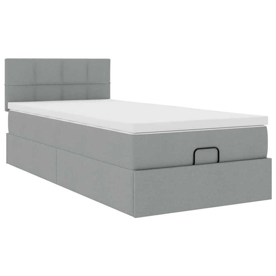 Ottoman bed met matras en LED's 100x200 cm stof lichtgrijs