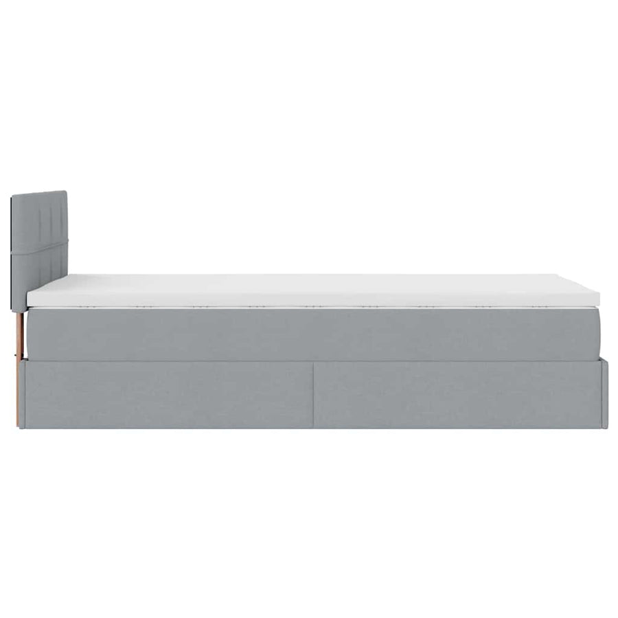 Ottoman bed met matras en LED's 100x200 cm stof lichtgrijs