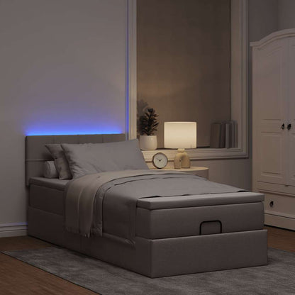 Ottoman bed met matras en LED's 100x200 cm stof taupe