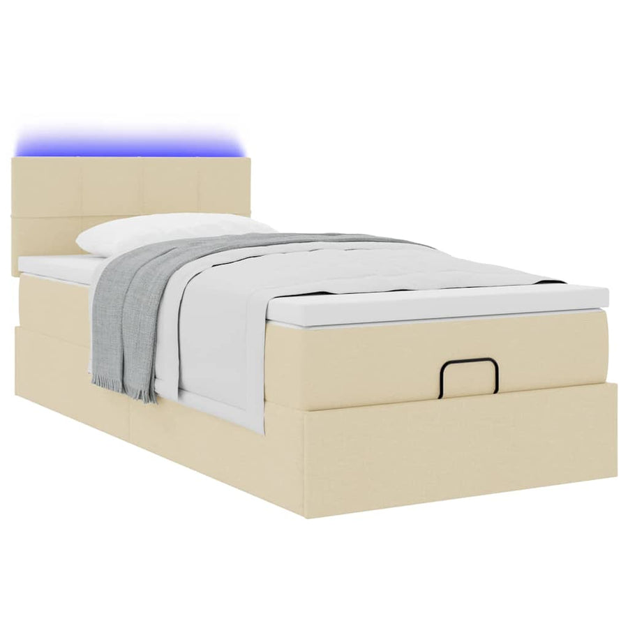 Ottoman bed met matras en LED's 100x200 cm stof crèmekleurig