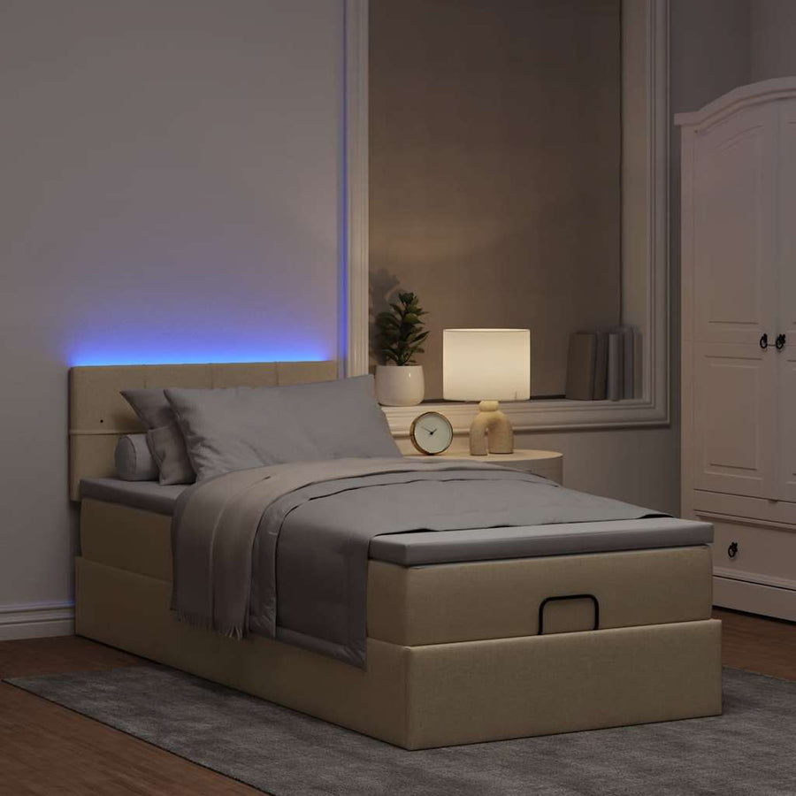 Ottoman bed met matras en LED's 100x200 cm stof crèmekleurig