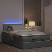 Ottomaans bed 120x190 cm stof lichtgrijs met matras en LED