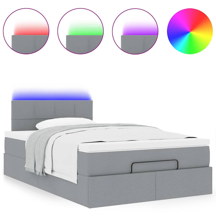 Ottoman bed met matras en LED's 120x200 cm stof lichtgrijs