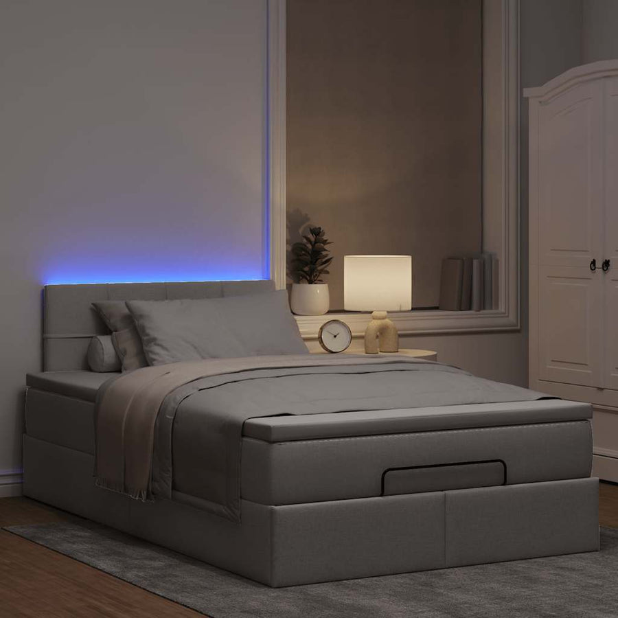 Ottoman bed met matras en LED's 120x200cm stof taupe