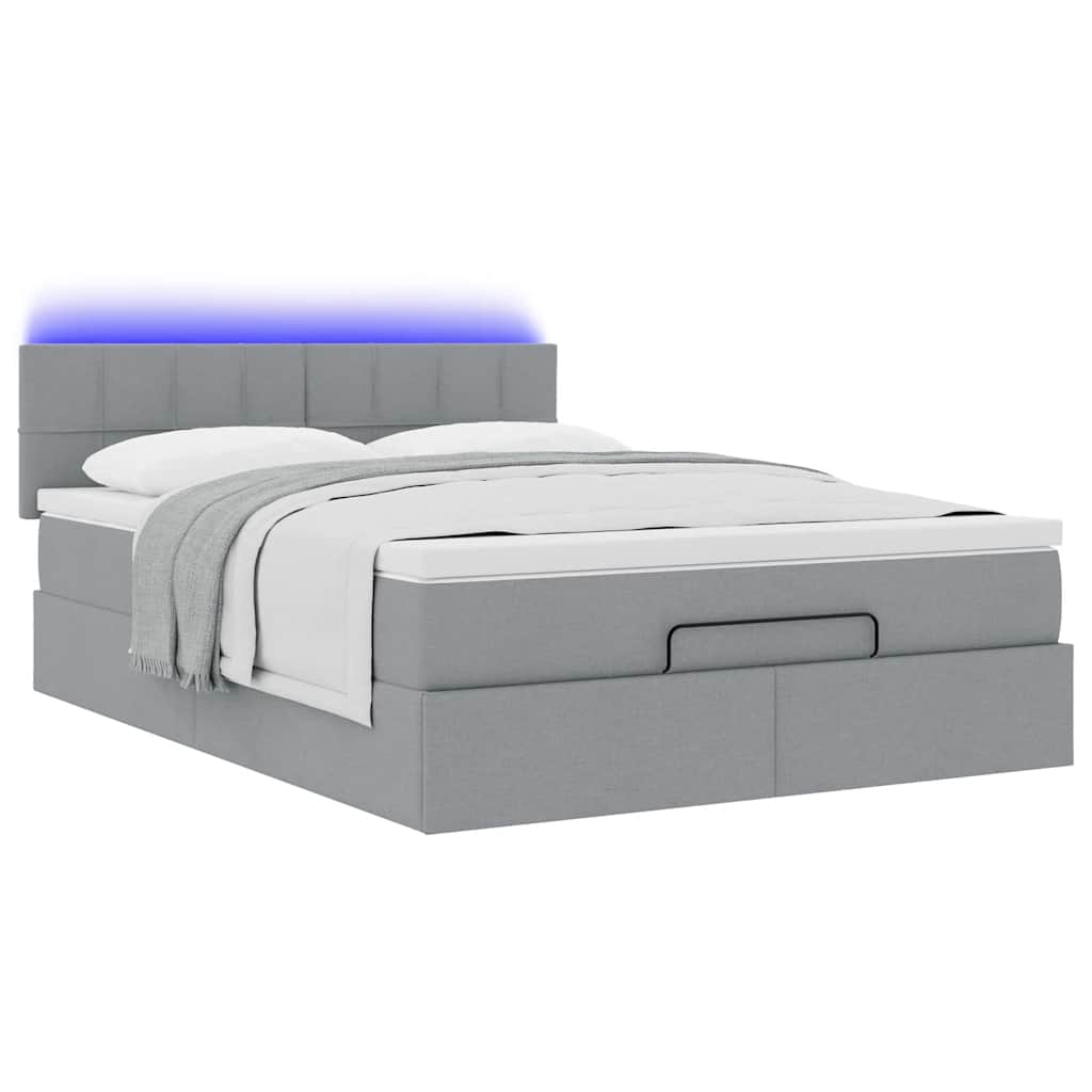 Ottoman bed met matras en LED's 140x200cm stof lichtgrijs