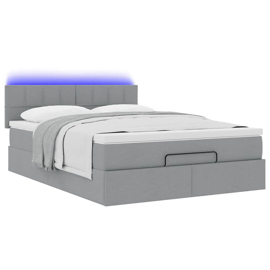 Ottoman bed met matras en LED's 140x200cm stof lichtgrijs