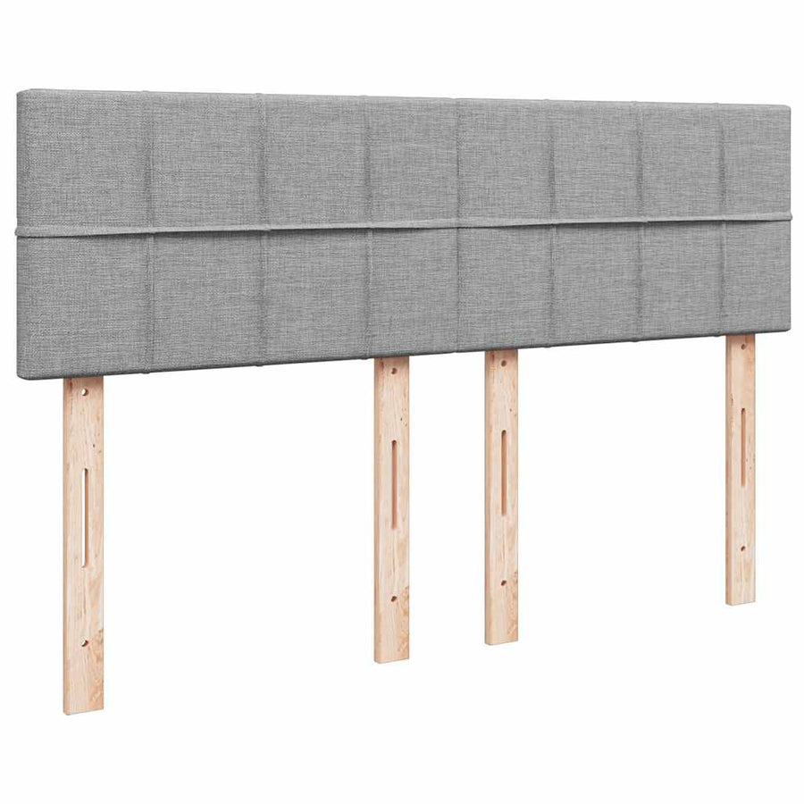 Ottoman bed met matras en LED's 140x200cm stof lichtgrijs