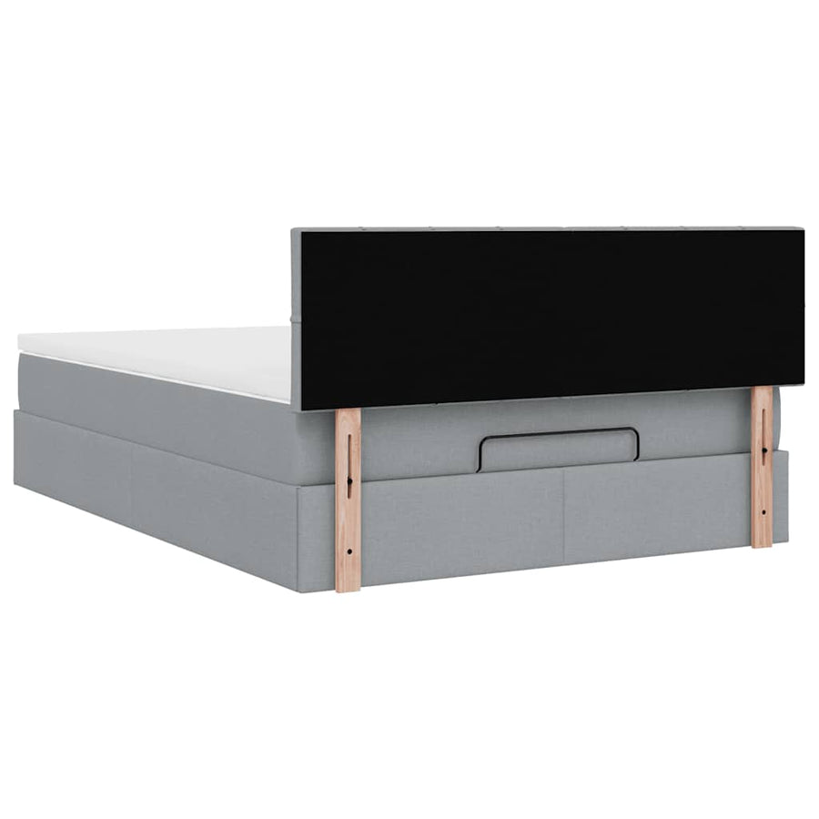 Ottoman bed met matras en LED's 140x200cm stof lichtgrijs