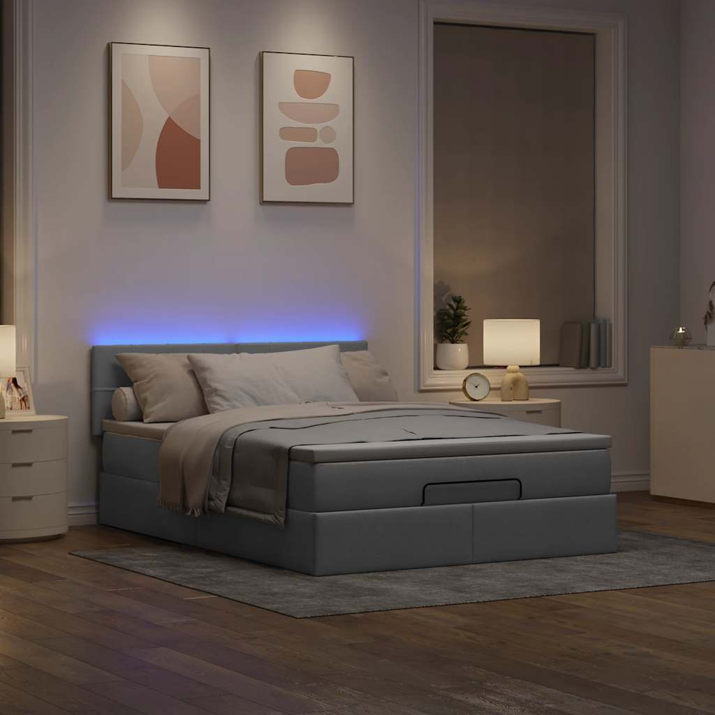 Ottoman bed met matras en LED's 140x200cm stof lichtgrijs