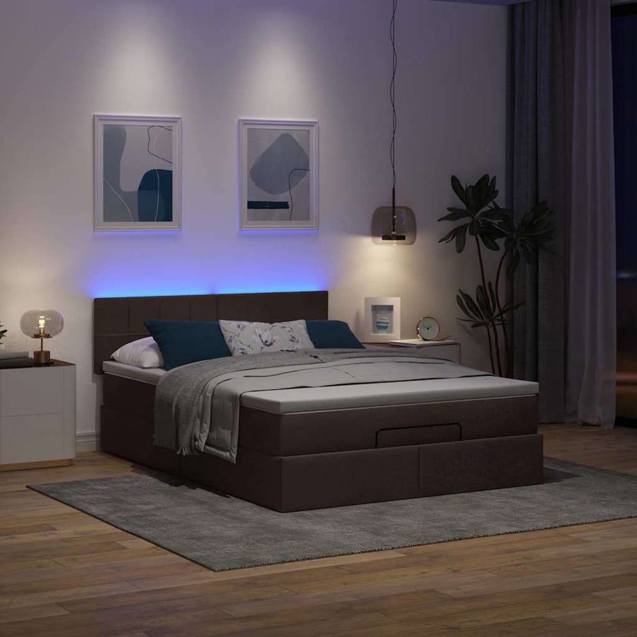 Ottoman bed met matras en LED's 140x200cm stof donkerbruin