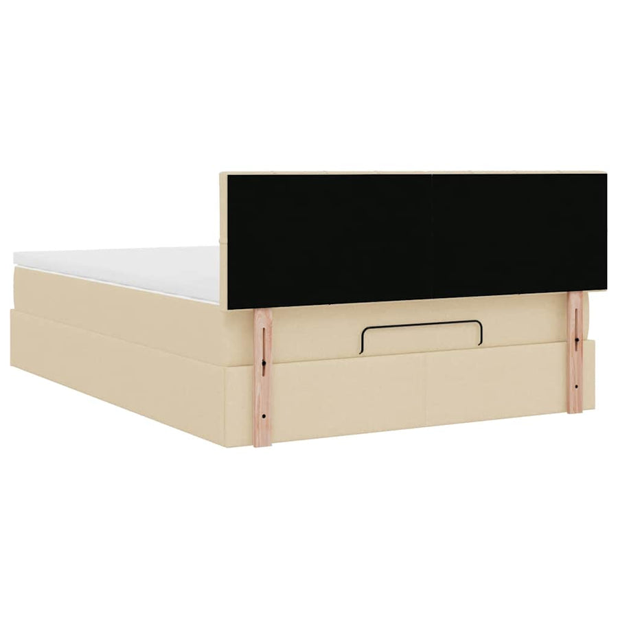 Ottoman bed met matras en LED's 140x200 cm stof crèmekleurig