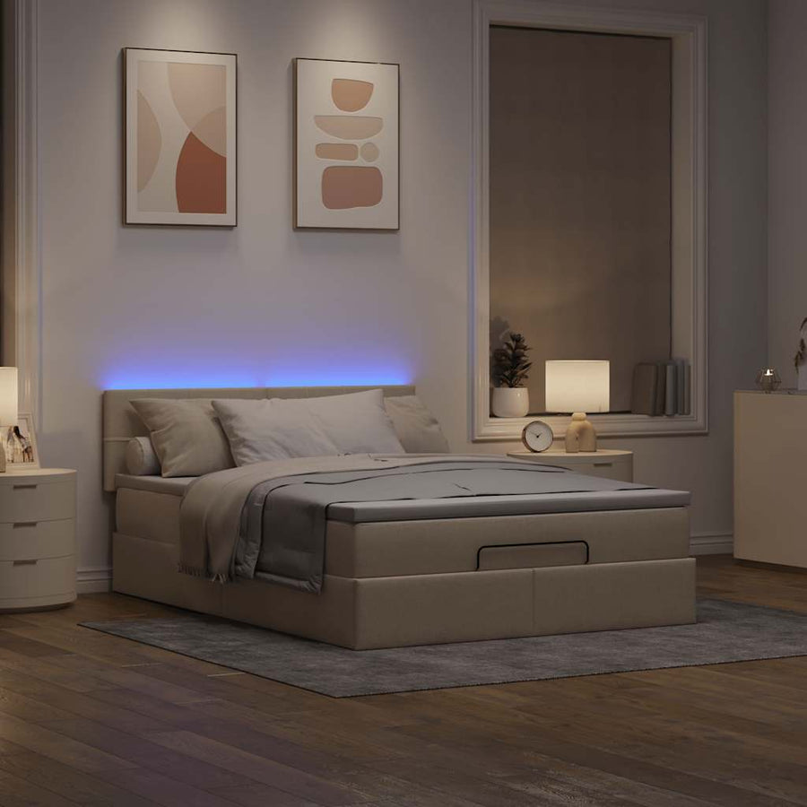 Ottoman bed met matras en LED's 140x200 cm stof crèmekleurig