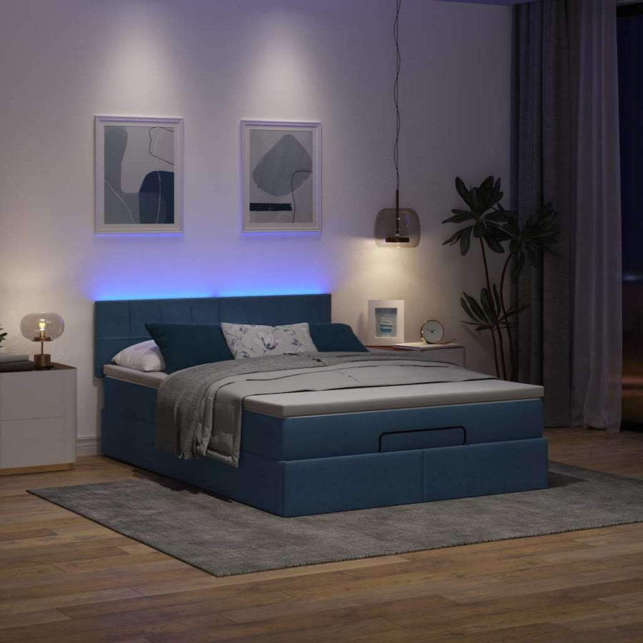 Ottoman bed met matras en LED's 140x200cm stof blauw