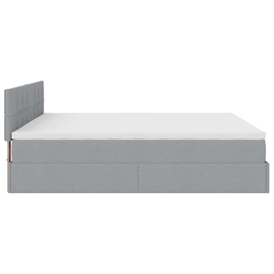 Ottoman bed met matras en LED's 160x200 cm stof lichtgrijs