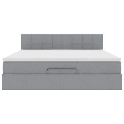 Ottoman bed met matras en LED's 180x200cm stof lichtgrijs