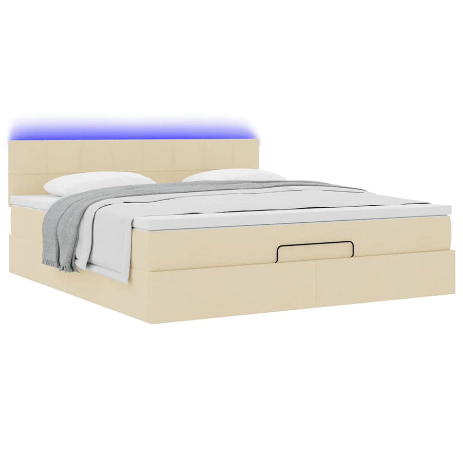 Ottoman bed met matras en LED's 180x200cm stof crèmekleurig
