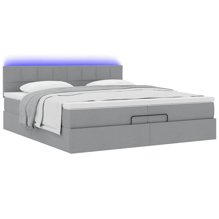 Ottoman bed met matrassen en LED's 200x200cm stof lichtgrijs