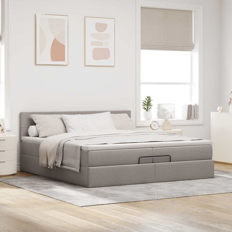 Ottoman bed met matrassen en LED's 200x200cm stof taupe