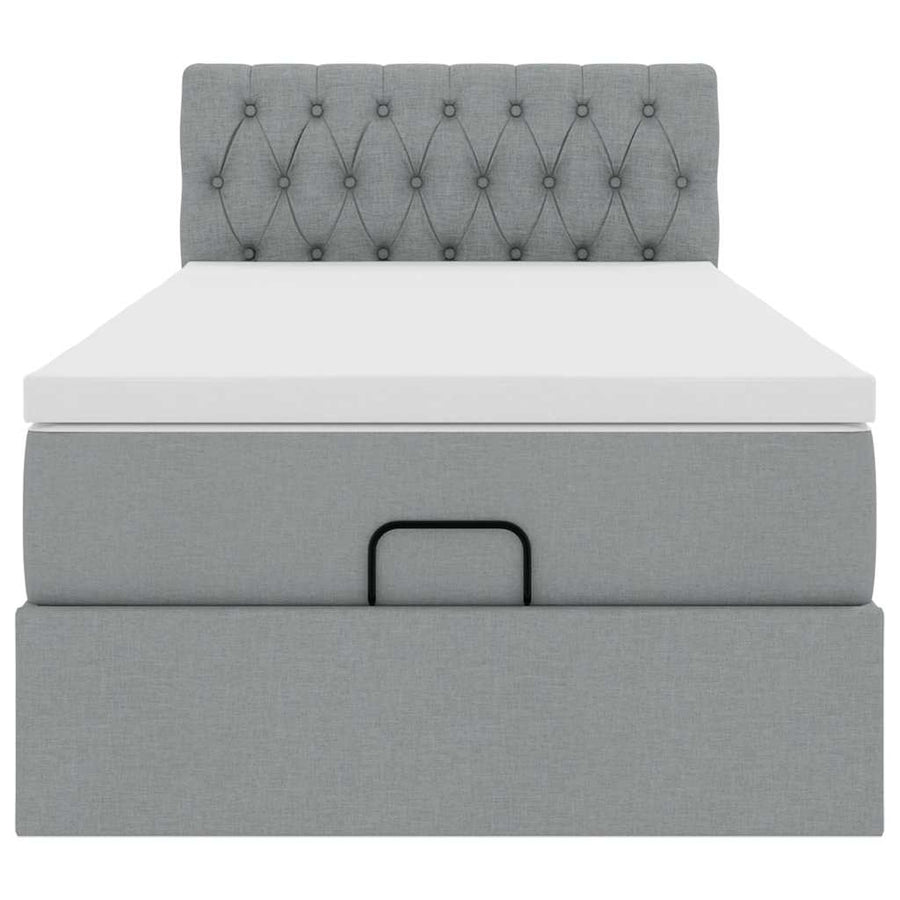 Ottoman bed met matras en LED's 80x200cm stof lichtgrijs