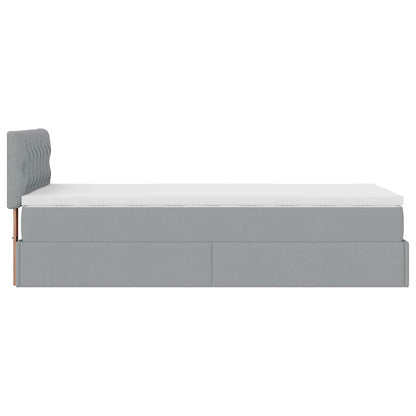 Ottoman bed met matras en LED's 80x200cm stof lichtgrijs