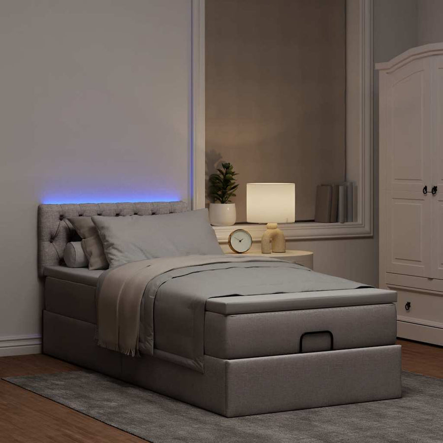 Ottoman bed met matras en LED's 80x200cm stof taupe