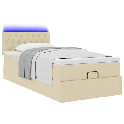 Ottoman bed met matras en LED's 80x200cm stof crèmekleurig
