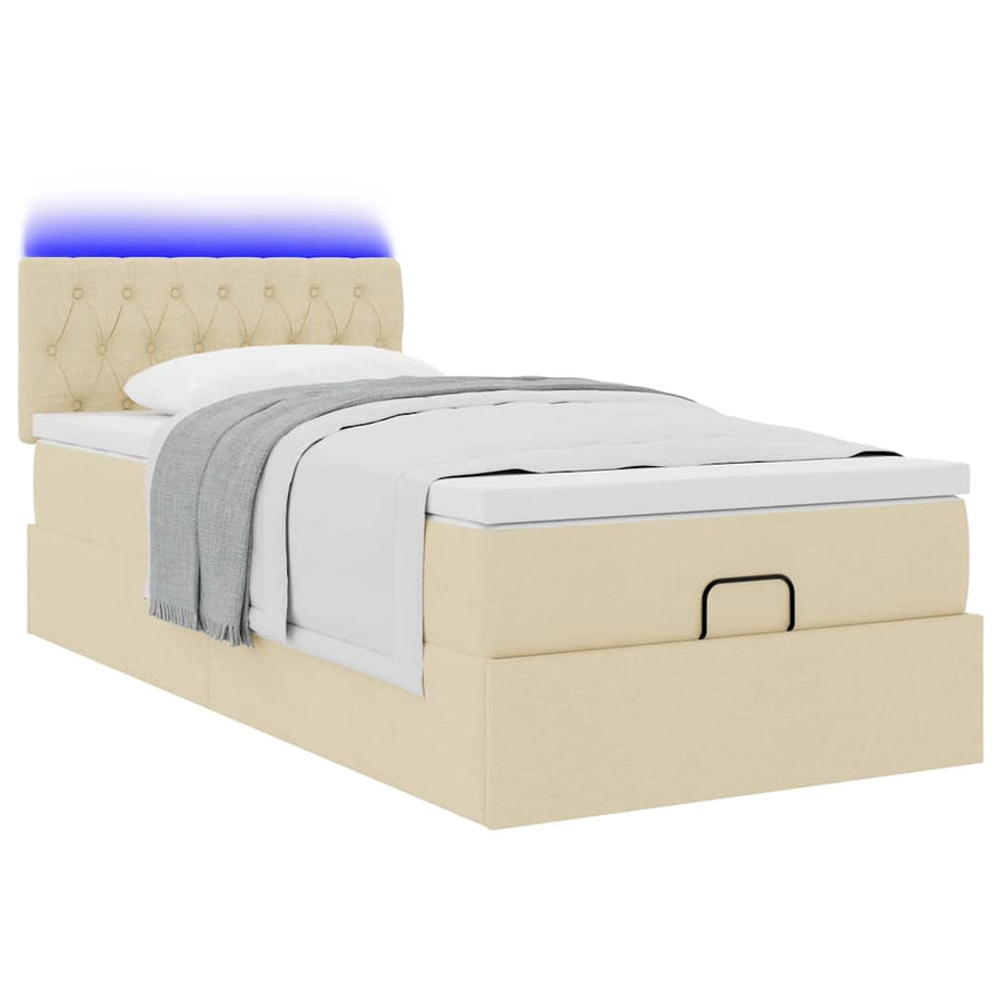 Ottoman bed met matras en LED's 80x200cm stof crèmekleurig