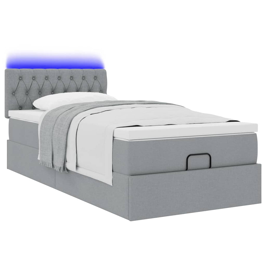 Ottoman bed met matras en LED's 90x190cm stof lichtgrijs