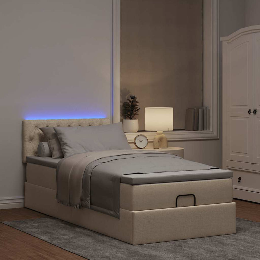 Ottoman bed met matras en LED's 90x190cm stof crèmekleurig