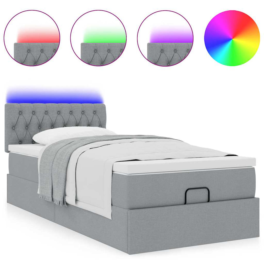 Ottoman bed met matras en LED's 90x200 cm stof lichtgrijs