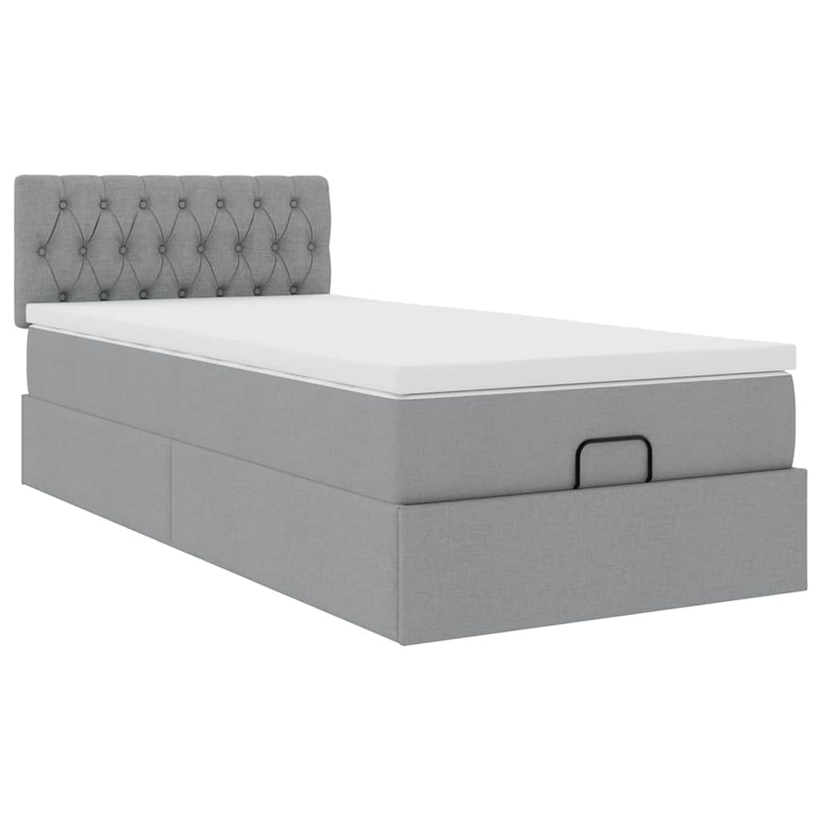 Ottoman bed met matras en LED's 90x200 cm stof lichtgrijs