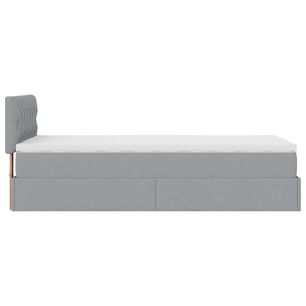 Ottoman bed met matras en LED's 90x200 cm stof lichtgrijs