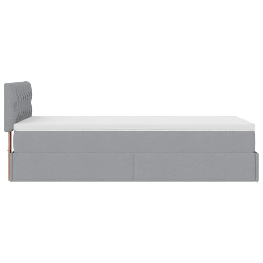 Ottoman bed met matras en LED's 90x200 cm stof lichtgrijs