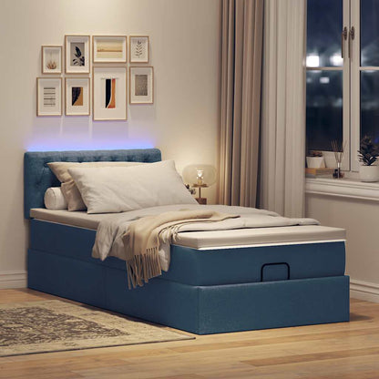 Ottoman bed met matras en LED's 90x200 cm stof blauw