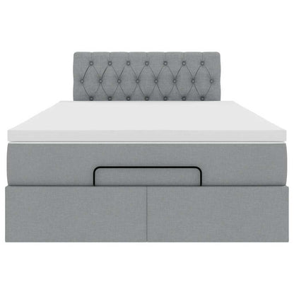 Ottoman bed met matras en LED's 120x190 cm stof lichtgrijs