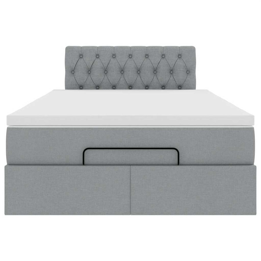 Ottoman bed met matras en LED's 120x190 cm stof lichtgrijs