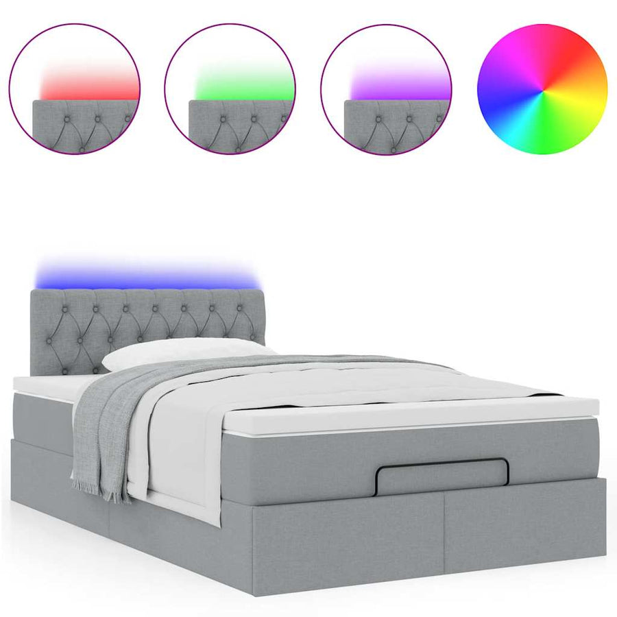 Ottoman bed met matras en LED's 120x200 cm stof lichtgrijs