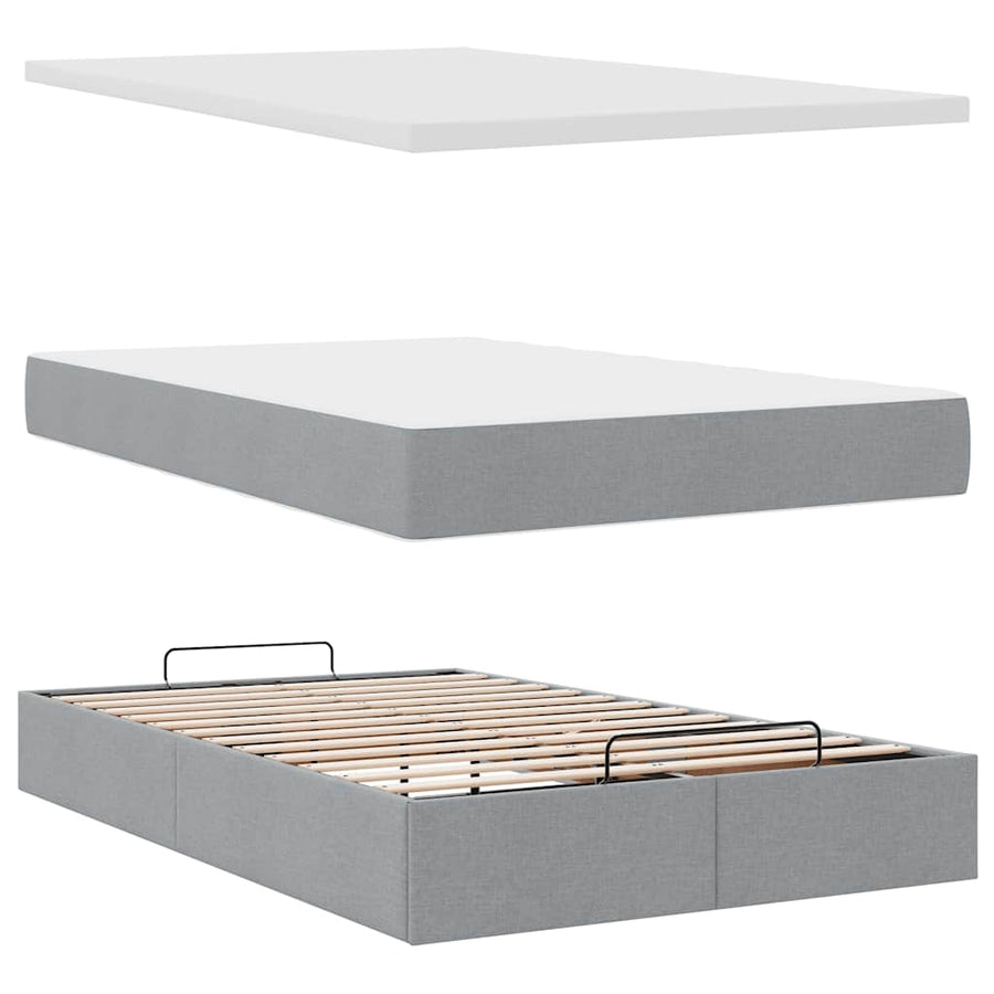Ottoman bed met matras en LED's 120x200 cm stof lichtgrijs