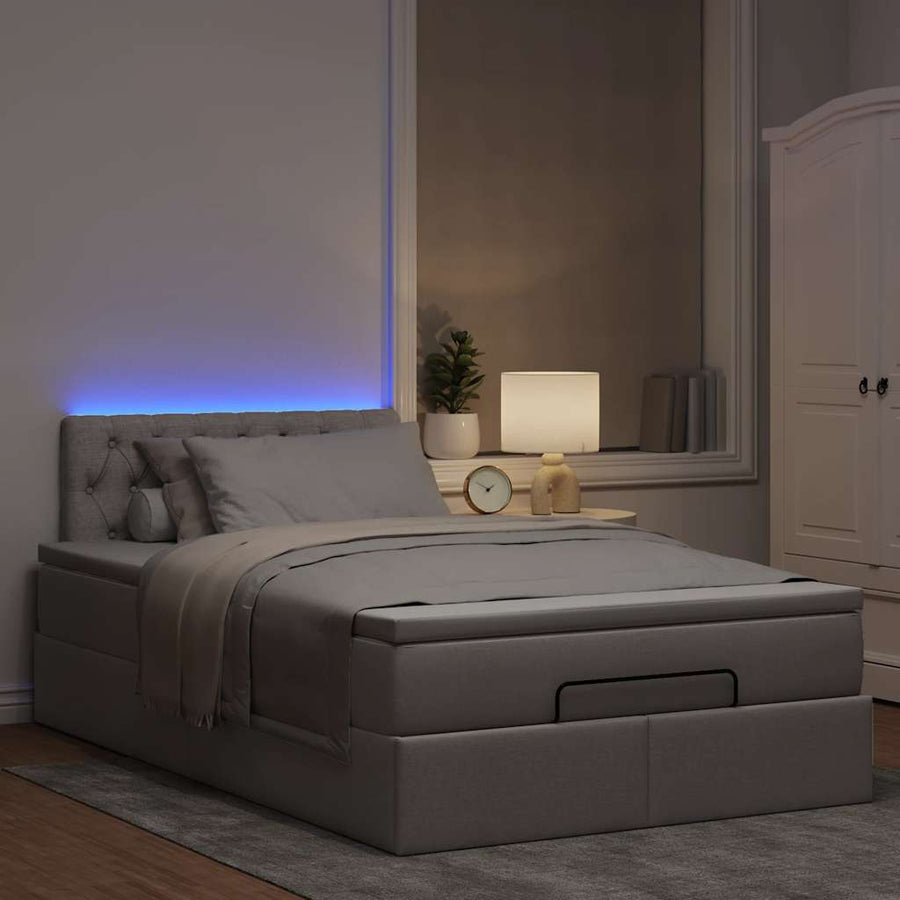Ottoman bed met matras en LED's 120x200cm stof taupe