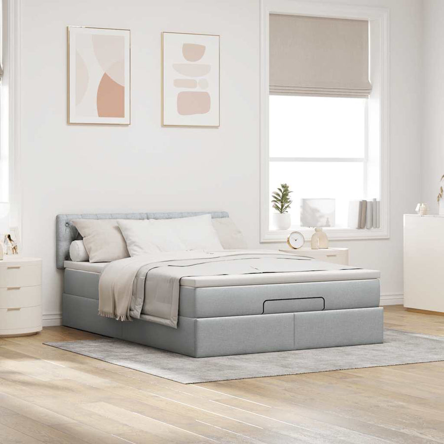 Ottoman bed met matras en LED's 140x200cm stof lichtgrijs