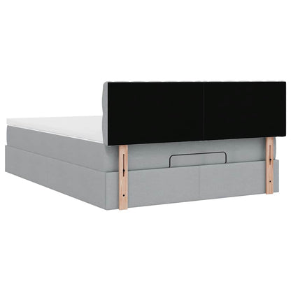 Ottoman bed met matras en LED's 140x200cm stof lichtgrijs