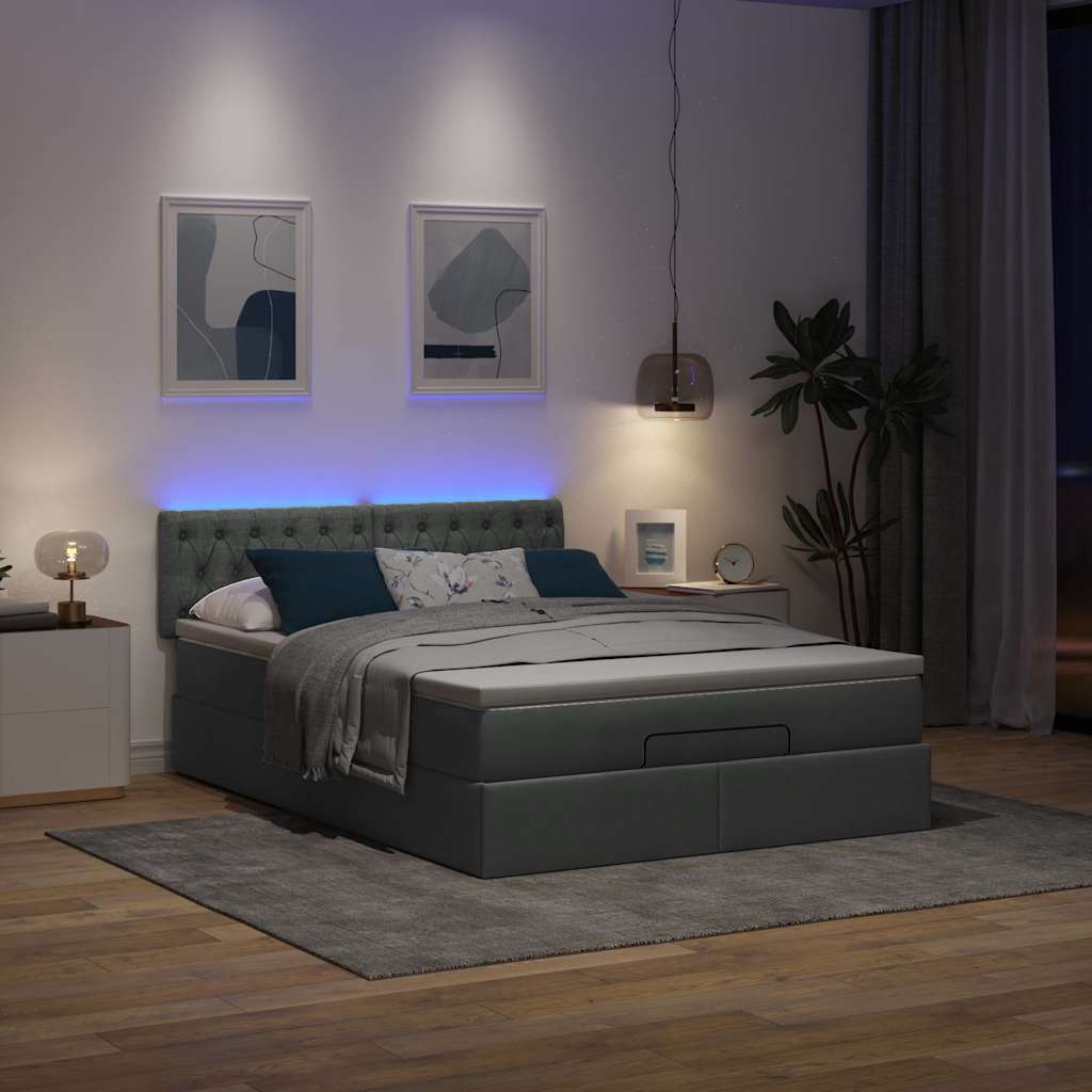 Ottoman bed met matras en LED's 140x200 cm stof donkergrijs