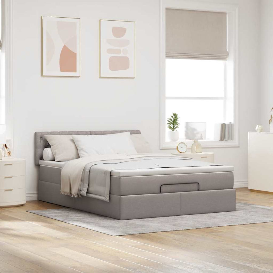 Ottoman bed met matras en LED's 140x200 cm stof taupe