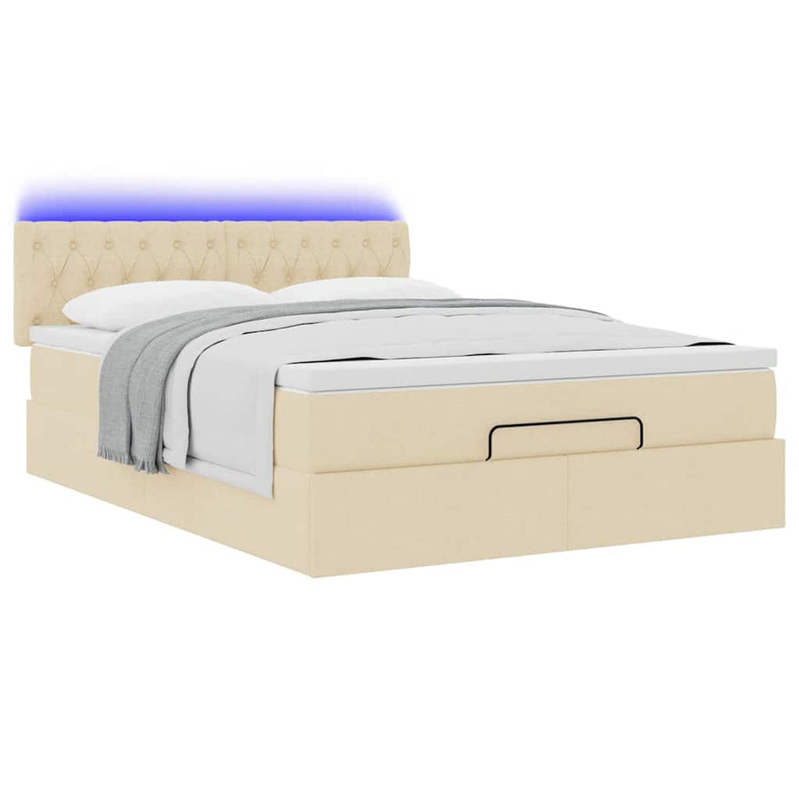 Ottoman bed met matras en LED's 140x200 cm stof crèmekleurig