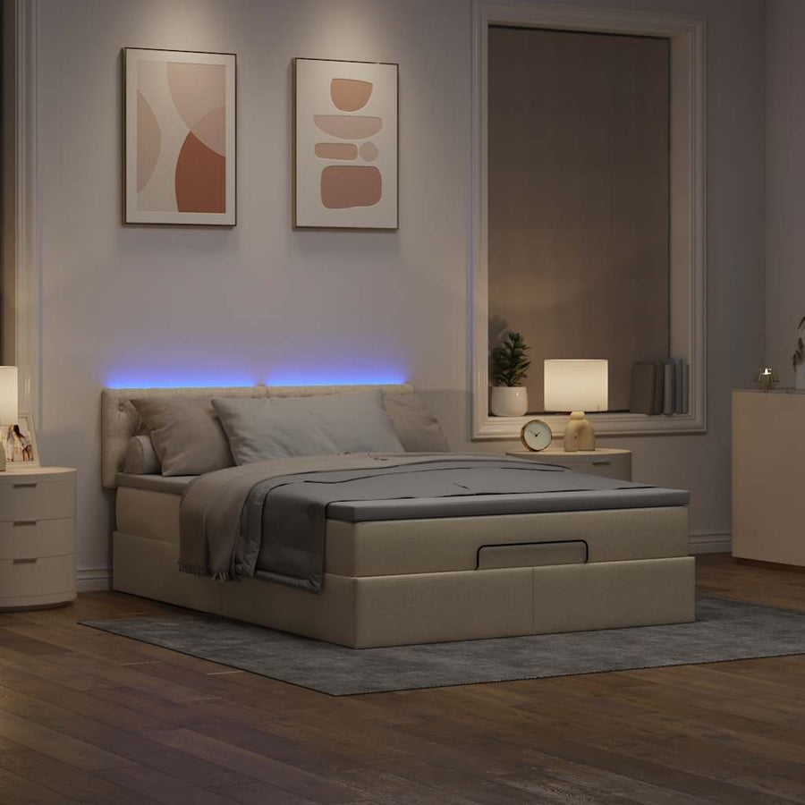 Ottoman bed met matras en LED's 140x200 cm stof crèmekleurig
