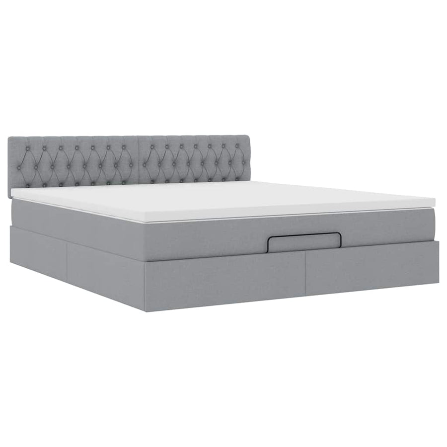 Ottoman bed met matras en LED's 160x200 cm stof lichtgrijs
